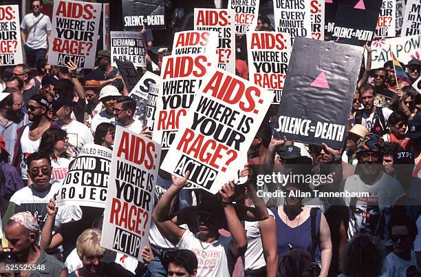 25th Annual Gay Pride Parade in NYC: Act Up Demo protesting AIDS epidemic with placardfs reading: 'AIDS: Where Is Your Rage?', New York, New York,...
