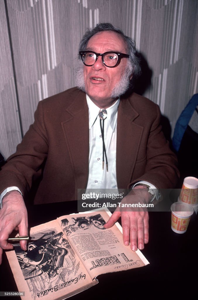 Science Fiction author Isaac Asimov with a copy of 'I, Robot'
