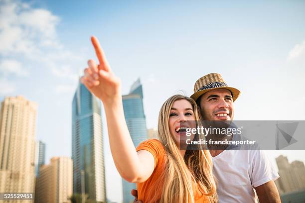 togetherness couple on the beach - dubai tourist stock pictures, royalty-free photos & images