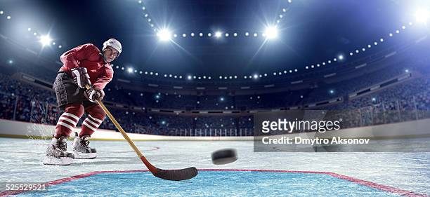 ice hockey player scoring baner ready - hockey stick stock pictures, royalty-free photos & images