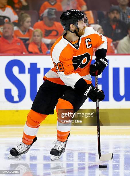 Claude Giroux of the Philadelphia Flyers takes the puck against the Washington Capitals in Game Three of the Eastern Conference First Round during...