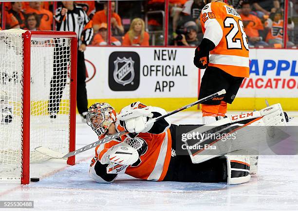 Steve Mason of the Philadelphia Flyers reacts after the Washington Capitals scored in the third period in Game Three of the Eastern Conference First...