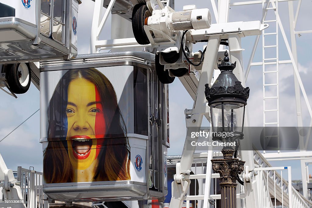 The Ferris wheel Decorated With Flags Of Countries Participating In The EURO 2016