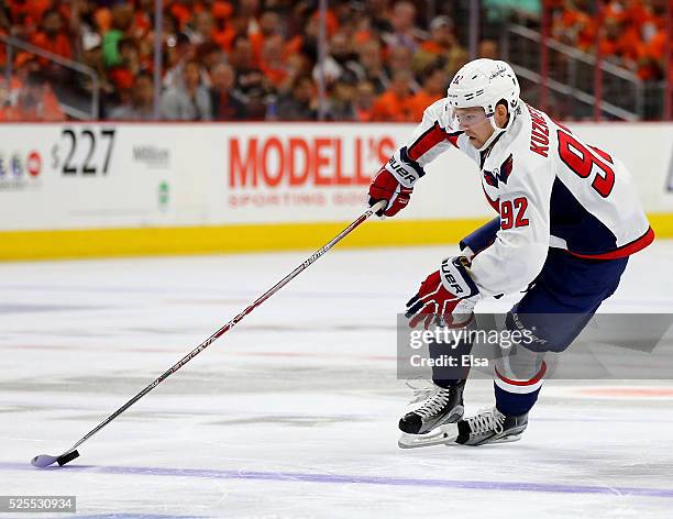 Evgeny Kuznetsov of the Washington Capitals takes the puck in the third period against the Philadelphia Flyers in Game Three of the Eastern...