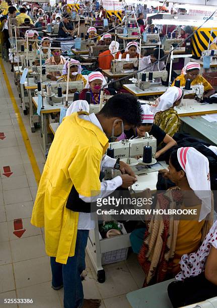 November 18, 2007 - Thousands of garment workers are employed to work sewing machines in the large scale Sepal Group factory to make clothing for the...
