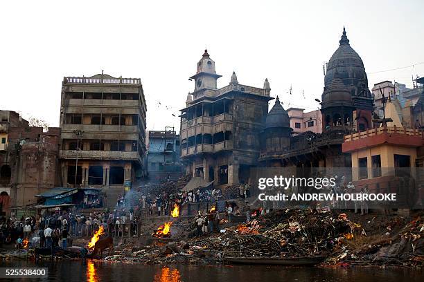 February 12, 2012 - The dead are burned on funeral pyres at Manikarnika Ghat, a cremation Ghat on the Ganges River at Varanasi. Known as the "Gateway...