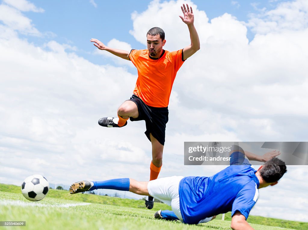 Men playing soccer