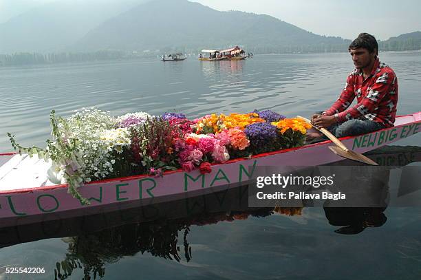 The floating vegetable, fruit and flower market on the Dal Lake in Srinagar. The vegetables are grown on floating beds and then sold on boats.