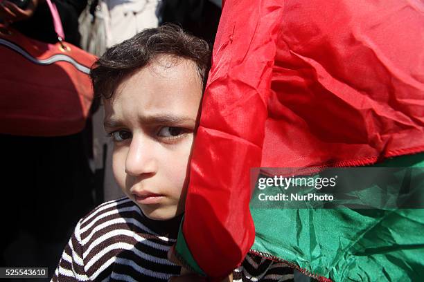 Palestinian women take part in a march to demand for the reconstruction of their homes, in Gaza City, on March 5 2015. At least 100,000 Palestinians...