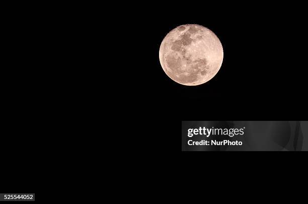 Quot;Super Moon&quot; shines over downtown S��o Paulo, Brasil. The phenomenon of the &quot;super moon&quot; occurs when the full moon coincides with...