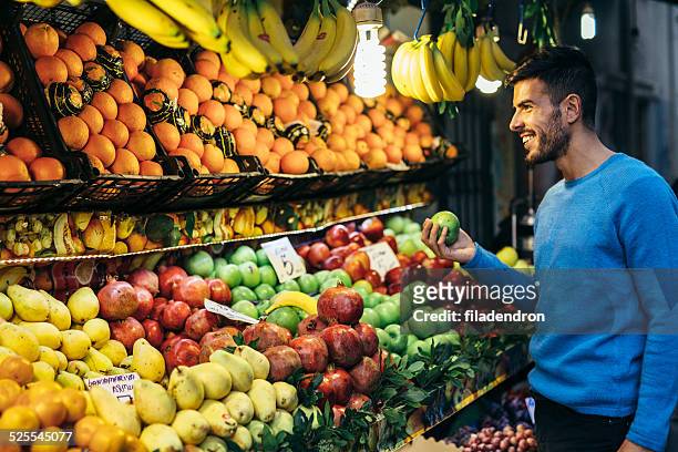 shopping fruits - fruit stand stock pictures, royalty-free photos & images