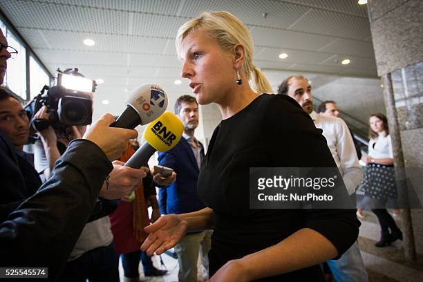 Labor Party MP Attje Kuiken is seen speaking to journalists on Tuesday explaining the government's new policy towards immigrants. Refugees from Syria...
