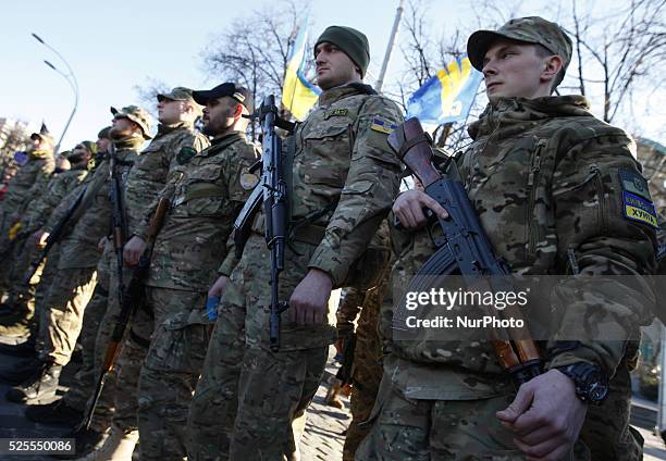 Servicemen of &quot;Sich&quot;, Ukrainian volunteer battalion, during the a ceremony in Kiev on March 16 before leaving to the east of the country to...