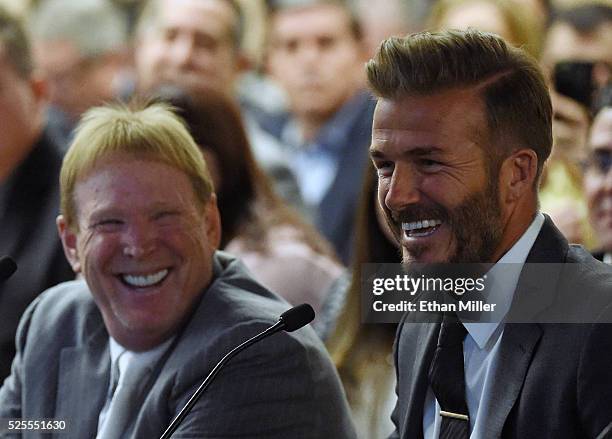 Oakland Raiders owner Mark Davis and former soccer player David Beckham laugh as they attend a Southern Nevada Tourism Infrastructure Committee...