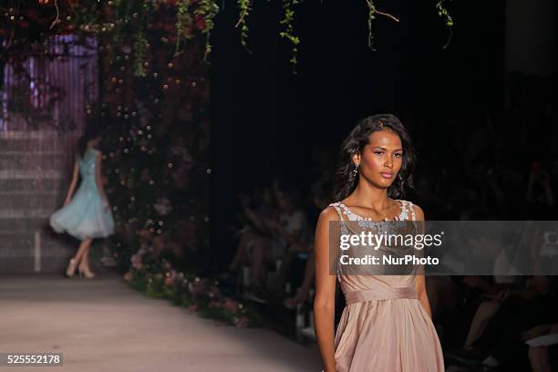 Model walks the runway during the Samuel Cirnansck fashion show as part of Sao Paulo Fashion Week - winter 2016 on October 21, 2015 in Sao Paulo,...