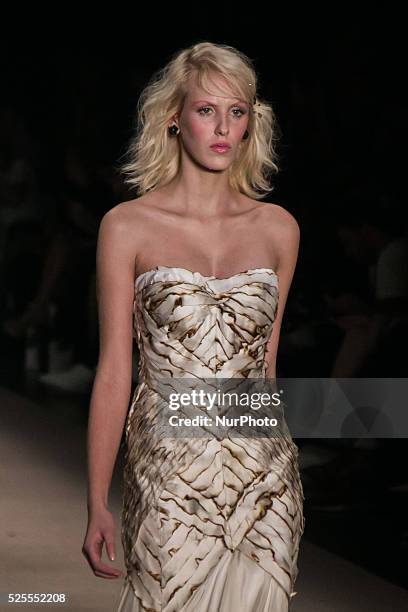 Model walks the runway during the Samuel Cirnansck fashion show as part of Sao Paulo Fashion Week - winter 2016 on October 21, 2015 in Sao Paulo,...