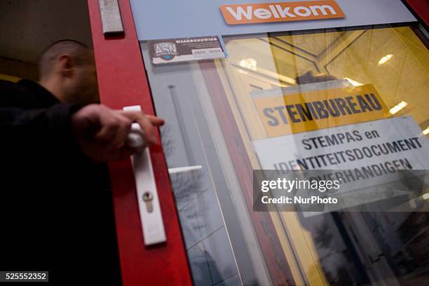 Residents of the town of Voorschoten can be seen voting at a railway station. In The Netherlands on Wednesday Dutch citizens and residents of voted...