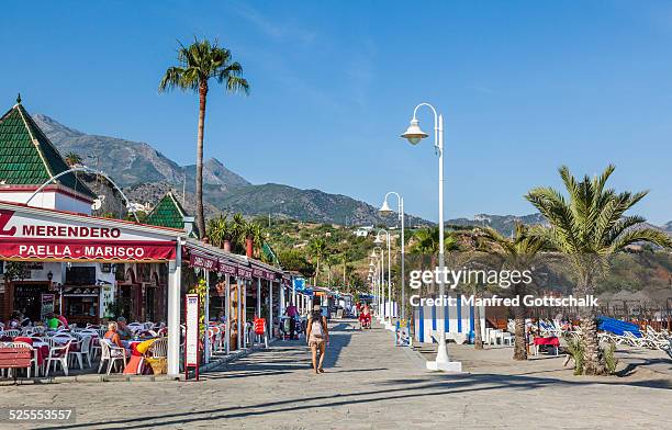 burriana beach promenade nerja - nerja stock pictures, royalty-free photos & images