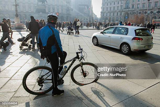 Man rides his bike in Milan, Italy, on December 29, 2015. Drivers in Milan will face a limit on daytime travel three days as the northern Italian...