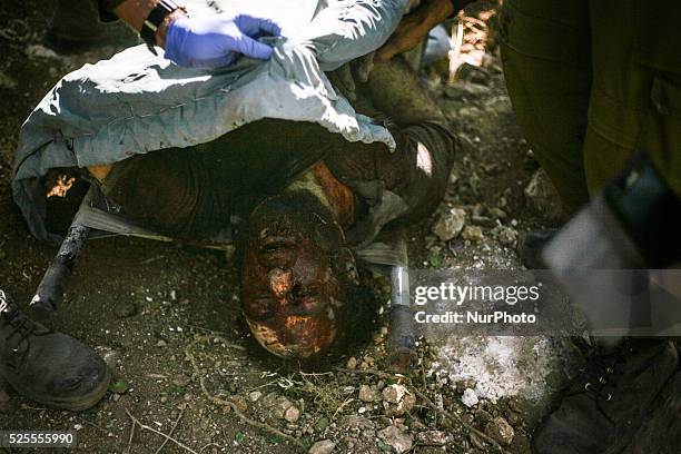 Israeli troops kill a Palestinian "Mohammed Assi" during clashes in the village of Bil'in near the West Bank city of Ramallah October 22, 2013....