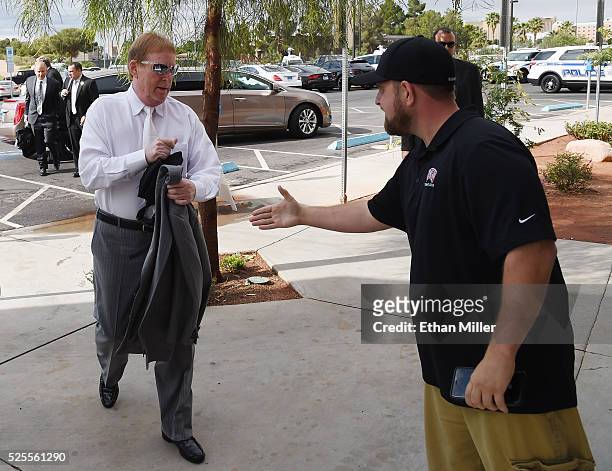 Oakland Raiders owner Mark Davis is greeted as he arrives at a Southern Nevada Tourism Infrastructure Committee meeting at UNLV on April 28, 2016 in...
