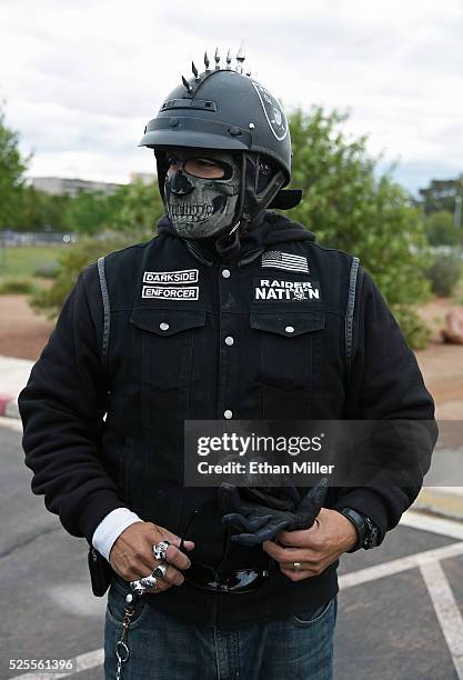 Oakland Raiders fan Eric Carrillo of Nevada arrives at a Southern Nevada Tourism Infrastructure Committee meeting at UNLV to see Raiders owner Mark...