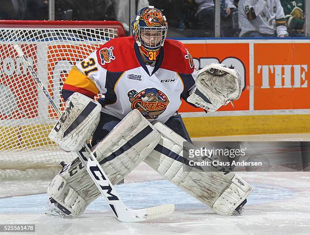 Devin Williams of the Erie Otters gets set to face a shot against the London Knights during game four of the OHL Western Conference Final on April...