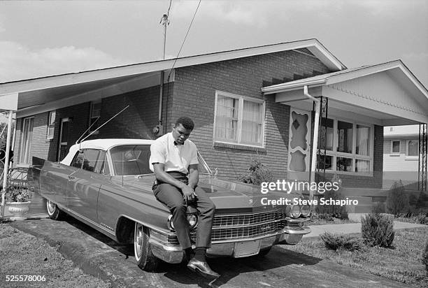 Cassius Clay, soon to be known as Muhammad Ali, at his parents' house in Louisville, Kentucky.