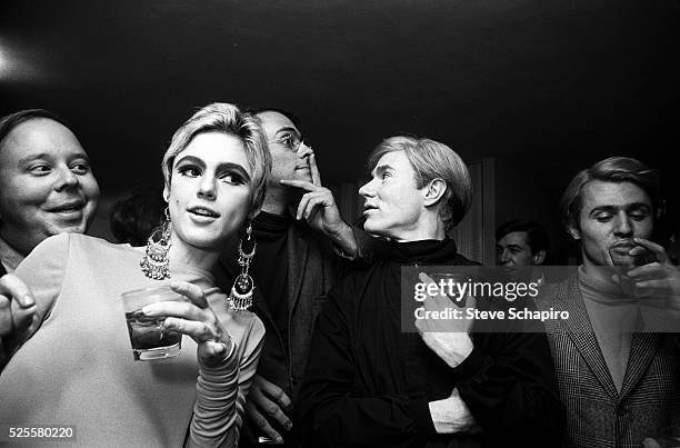 Portrait of, from left, American art critic and curator Henry Geldzahler , fashion model & actress Edie Sedgwick , actor and producer Fu-Fu Smith ,...