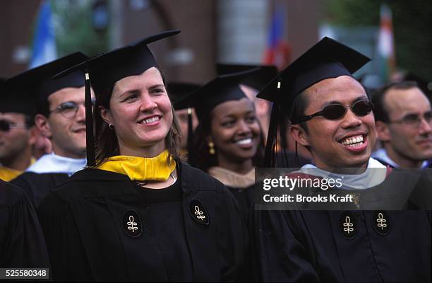 Harvard Business School students attend their graduation in Boston, MA. Harvard Business School is one of the graduate schools of Harvard University,...