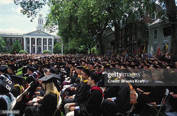 Harvard Business School students attend their graduation in Boston. It is one of the graduate schools of Harvard University, and is one of the...