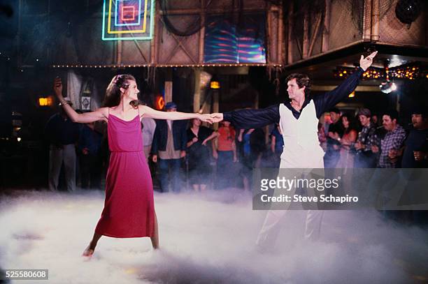 Robert Hays and Julie Hagerty parody Saturday Night Fever in a scene from Airplane!.