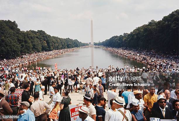 More than 200,000 people participated in the March on Washington demonstrations. The throng marched to the Mall and listened to Civil Rights leaders,...