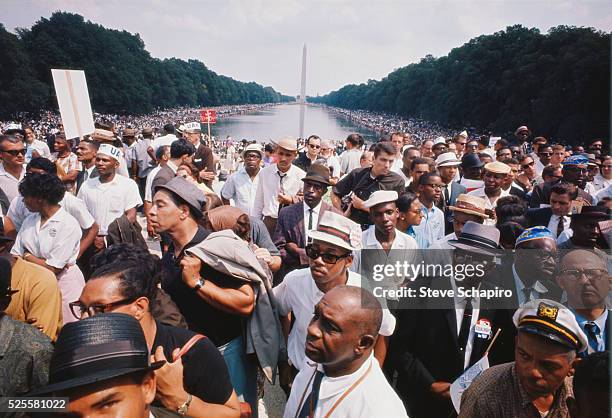 More than 200,000 people participated in the March on Washington demonstrations. The throng marched to the Mall and listened to Civil Rights leaders,...