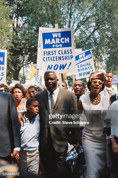 Jackie Robinson Marching with more than 200,000 others in the March on Washington demonstrations. The throng marched to the Mall and listened to...