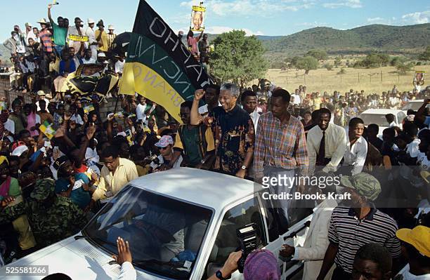 Nelson Mandela greets supports at a campaign stop. After more then 27 years in jail as an anti-apartheid activist, Nelson Mandela lead a 1994...