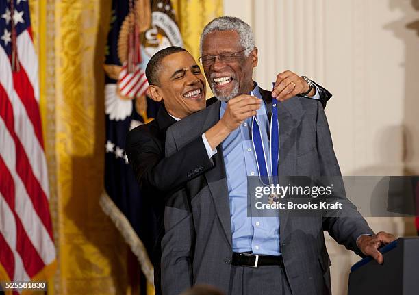 President Barack Obama awards the Medal of Freedom to basketball great Bill Russell during a ceremony to present the awards at the White House in...