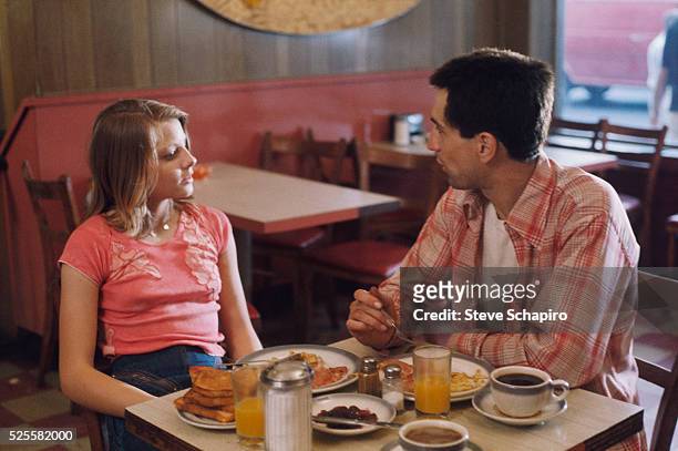 Jodie Foster shares breakfast in a diner with Robert De Niro in Martin Scorsese's Taxi Driver.