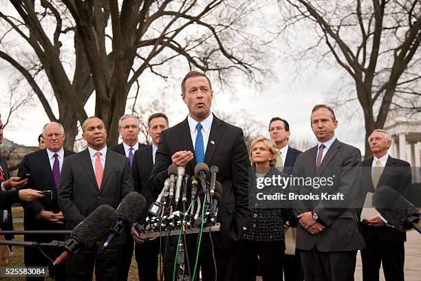 Maryland Gov. Martin O'Malley, center, speaks outside the White House in Washington, after Democratic governors met with President Barack Obama and...