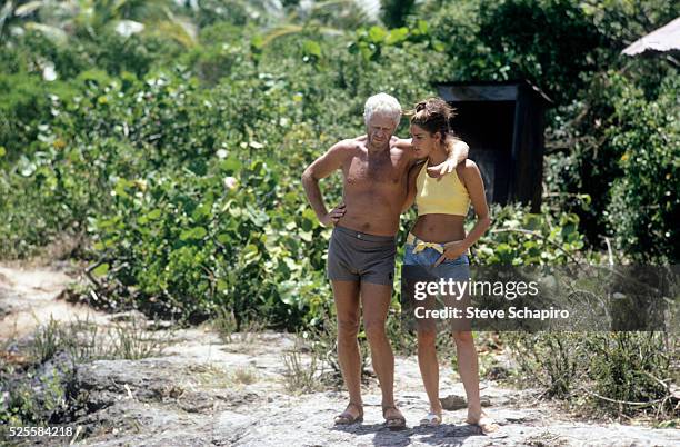 Steve McQueen and girlfriend Ali MacGraw talk during a break from filming the movie Papillon in Jamaica. The movie starred Steve McQueen and Dustin...