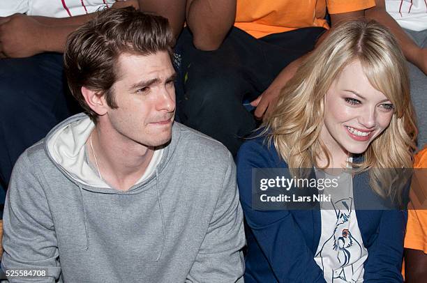 Andrew Garfield and Emma Stone of The Amazing Spider-man take part in the Be Amazing, Stand Up and Volunteer initiative at the Farragut House in...