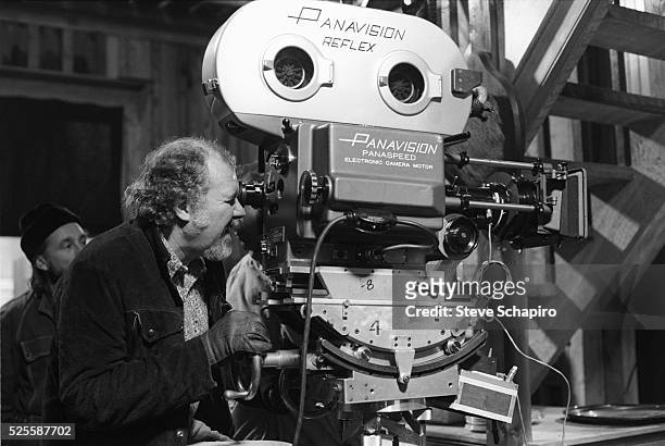 Director Robert Altman looking through camera during filming of McCabe and Mrs. Miller.