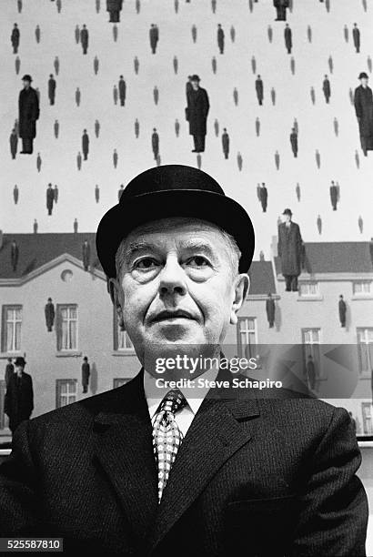 Belgian Surrealist painter Rene Magritte photographed at the Museum of Modern Art in New York City.