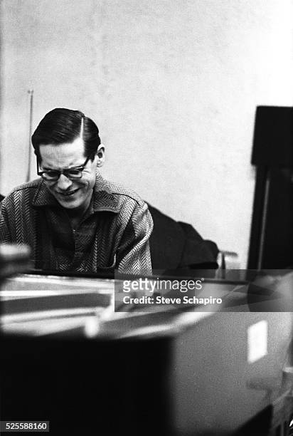 American jazz pianist and composer Bill Evans at the piano during rehearsals at Reeves Sound Studio in New York City, New York, circa 1960.