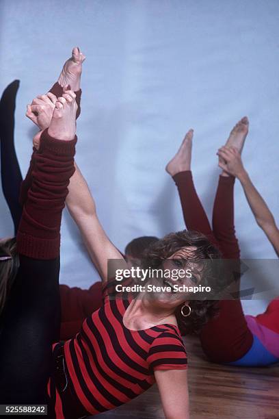 Jane Fonda posing for her book, the Jane Fonda Workout Book.