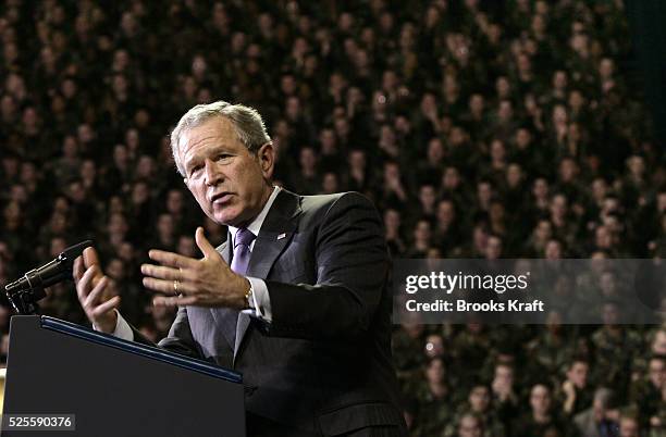 President George W. Bush speaks in front of soldiers who recently returned from Iraq at the Kansas State University in Manhattan, Kansas, January 23,...