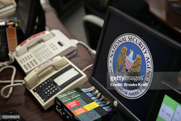 The National Security Agency logo is shown on a computer screen inside the Threat Operations Center at the NSA in Fort Meade, Maryland, January 25,...