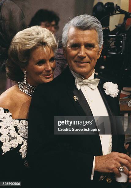 John Forsythe and Linda Evans on set of Dynasty