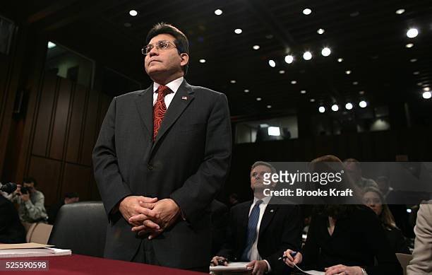 Attorney General Alberto Gonzales arrives at a Senate Judiciary Committee hearing on whether President Bush, and others in the executive branch,...