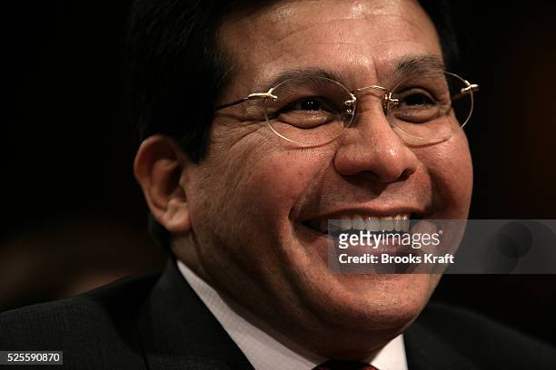 Attorney General Alberto Gonzales listens to questions from the Senate Judiciary Committee on whether the Bush Administration acted illegally in...